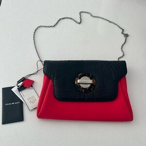 Emporio Armani red and black crossbody clutch bag with a chain strap.
